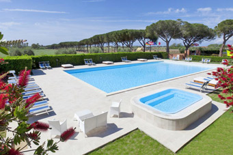 foto : vakantiepark met vakantiehuisje dichtbij strand onder Grosseto